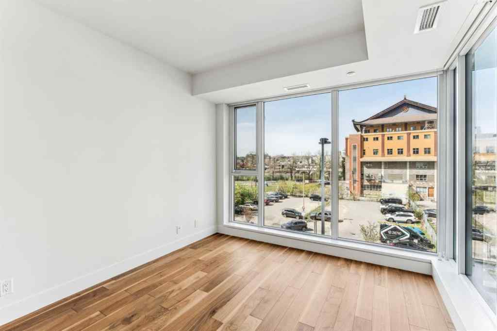 MLS® A2214218 - Unit #410 1025 5 Avenue SW in Downtown West End Calgary, Residential
