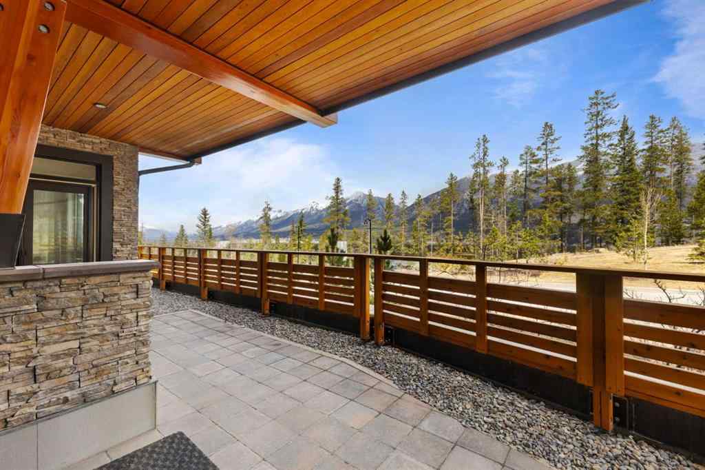 MLS® A2214279 - Unit #102 101A Stewart Creek Rise  in Three Sisters Canmore, Residential