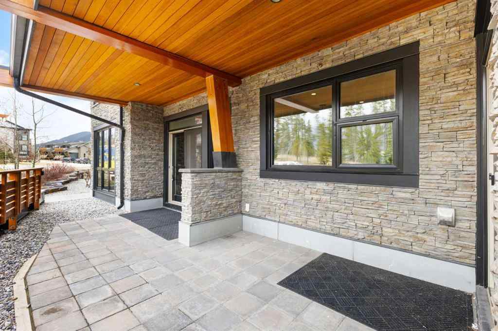 MLS® A2214279 - Unit #102 101A Stewart Creek Rise  in Three Sisters Canmore, Residential