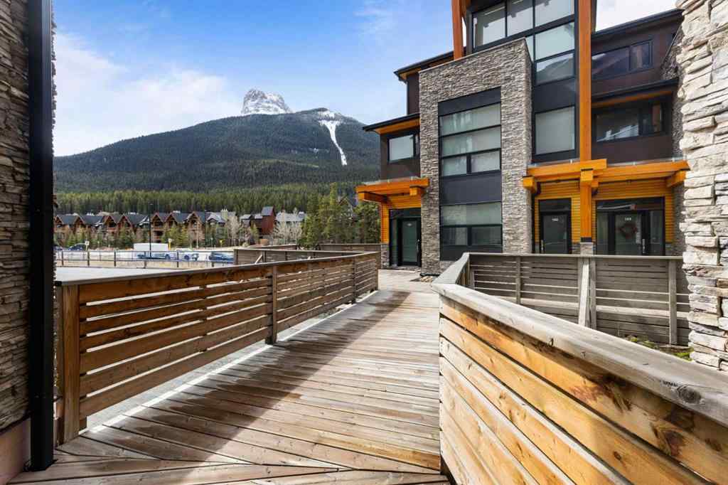 MLS® A2214279 - Unit #102 101A Stewart Creek Rise  in Three Sisters Canmore, Residential