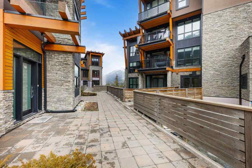 MLS® A2214279 - Unit #102 101A Stewart Creek Rise  in Three Sisters Canmore, Residential