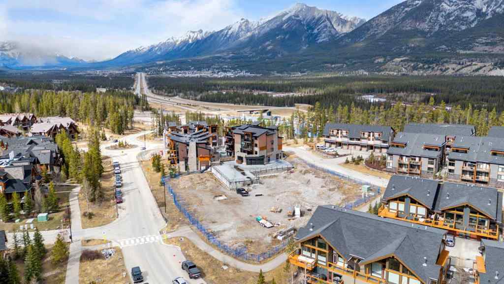 MLS® A2214279 - Unit #102 101A Stewart Creek Rise  in Three Sisters Canmore, Residential