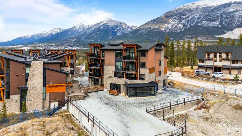 MLS® A2214279 - Unit #102 101A Stewart Creek Rise  in Three Sisters Canmore, Residential