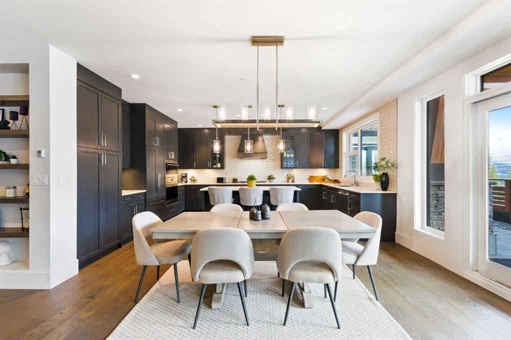 MLS® A2214279 - Unit #102 101A Stewart Creek Rise  in Three Sisters Canmore, Residential