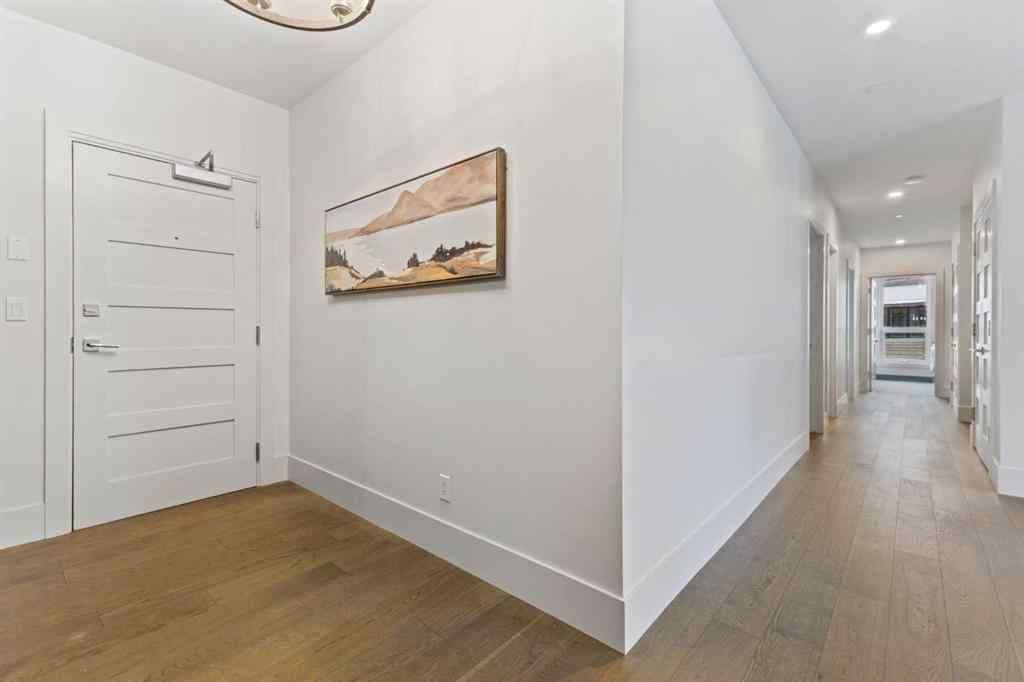 MLS® A2214279 - Unit #102 101A Stewart Creek Rise  in Three Sisters Canmore, Residential