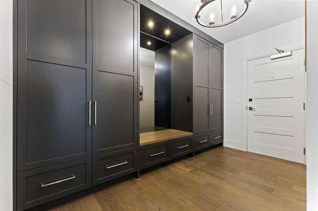 MLS® A2214279 - Unit #102 101A Stewart Creek Rise  in Three Sisters Canmore, Residential