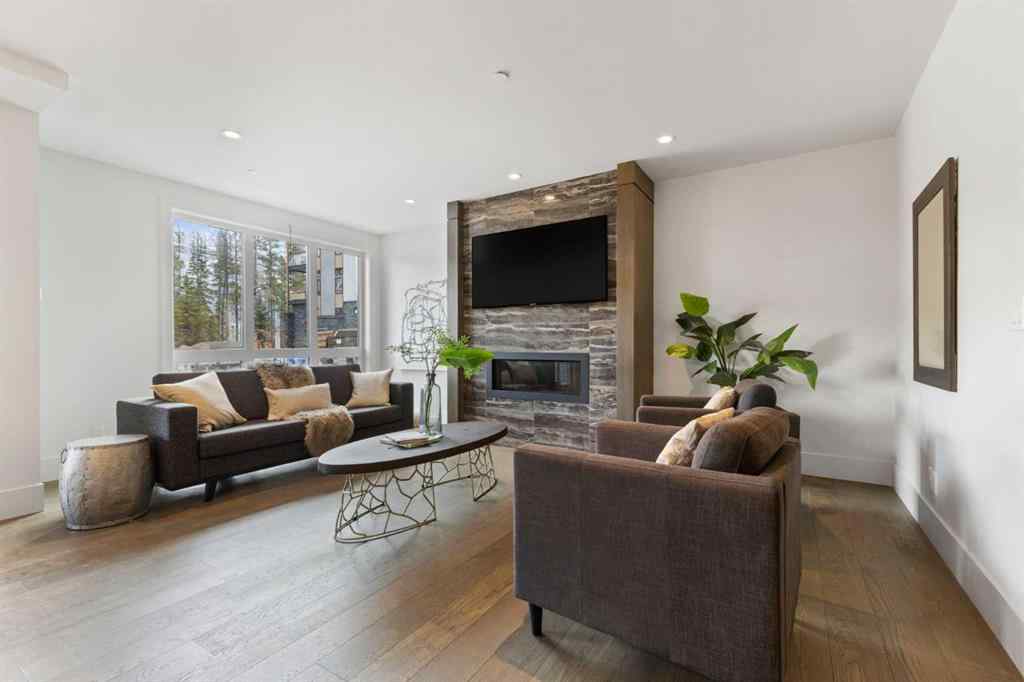 MLS® A2214279 - Unit #102 101A Stewart Creek Rise  in Three Sisters Canmore, Residential