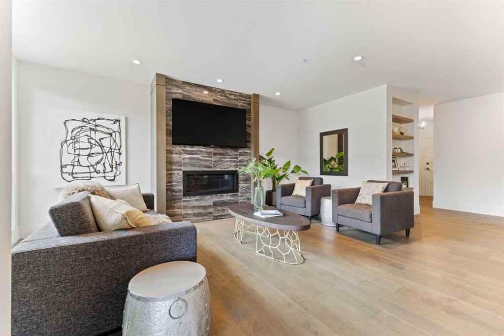 MLS® A2214279 - Unit #102 101A Stewart Creek Rise  in Three Sisters Canmore, Residential