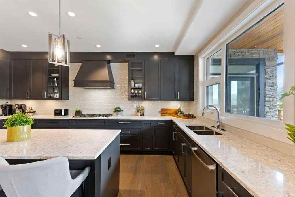 MLS® A2214279 - Unit #102 101A Stewart Creek Rise  in Three Sisters Canmore, Residential