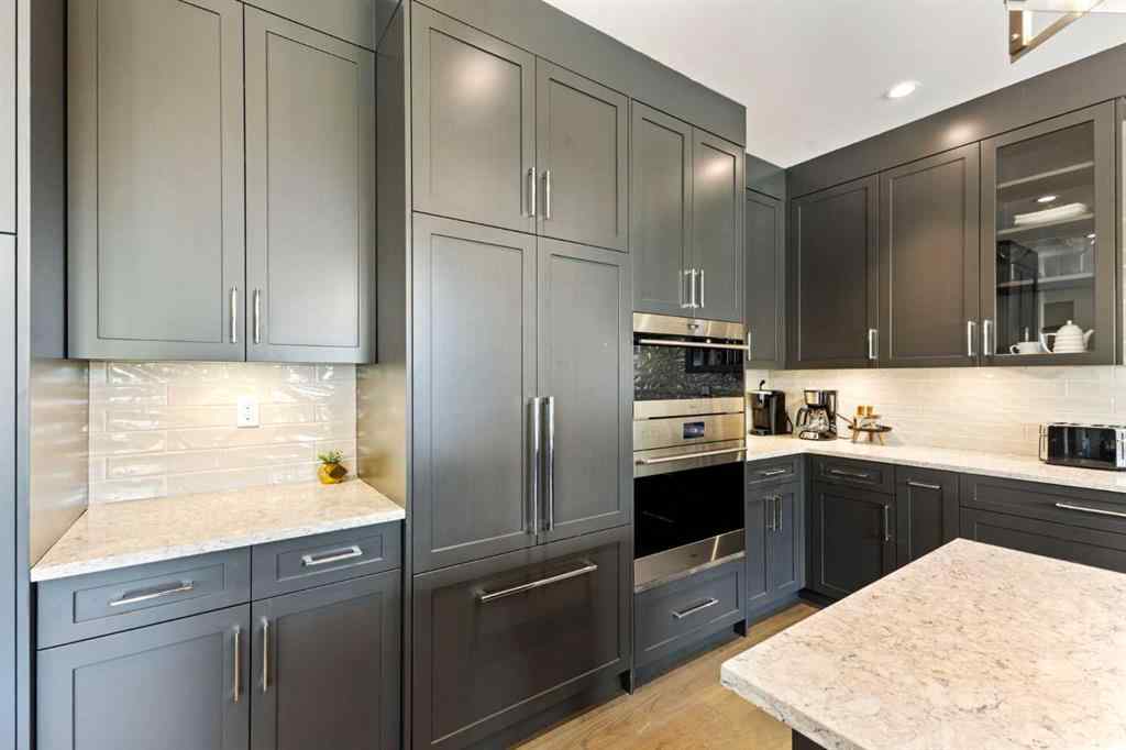 MLS® A2214279 - Unit #102 101A Stewart Creek Rise  in Three Sisters Canmore, Residential