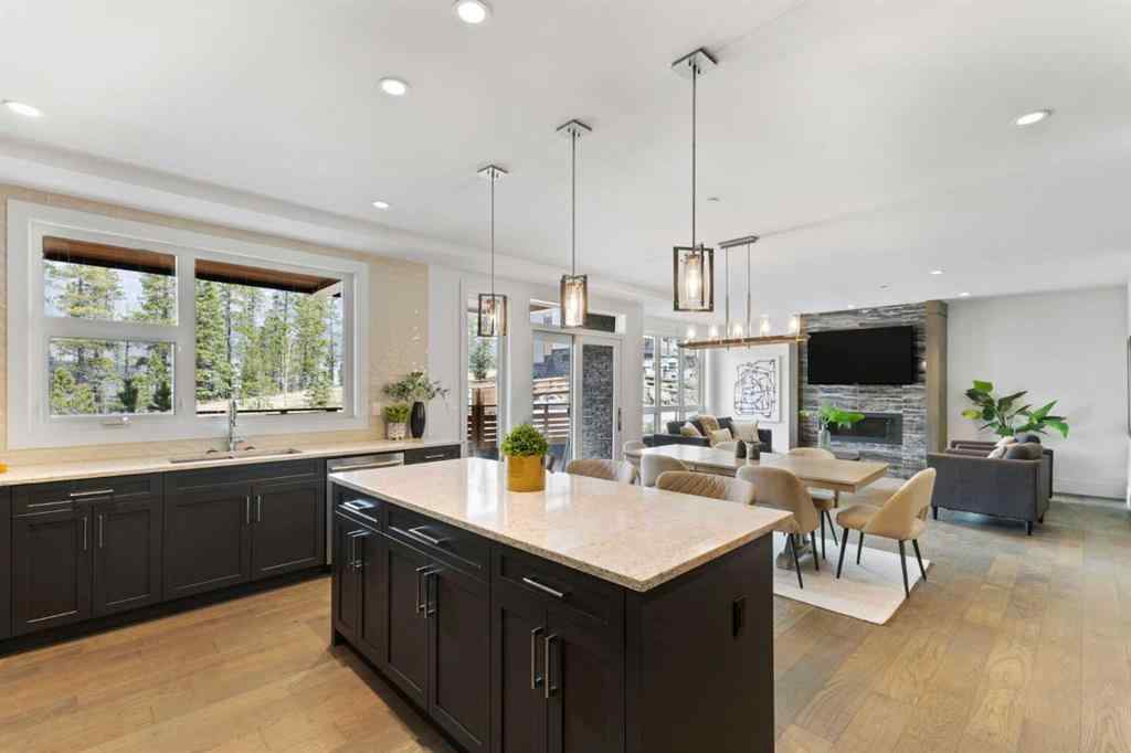 MLS® A2214279 - Unit #102 101A Stewart Creek Rise  in Three Sisters Canmore, Residential