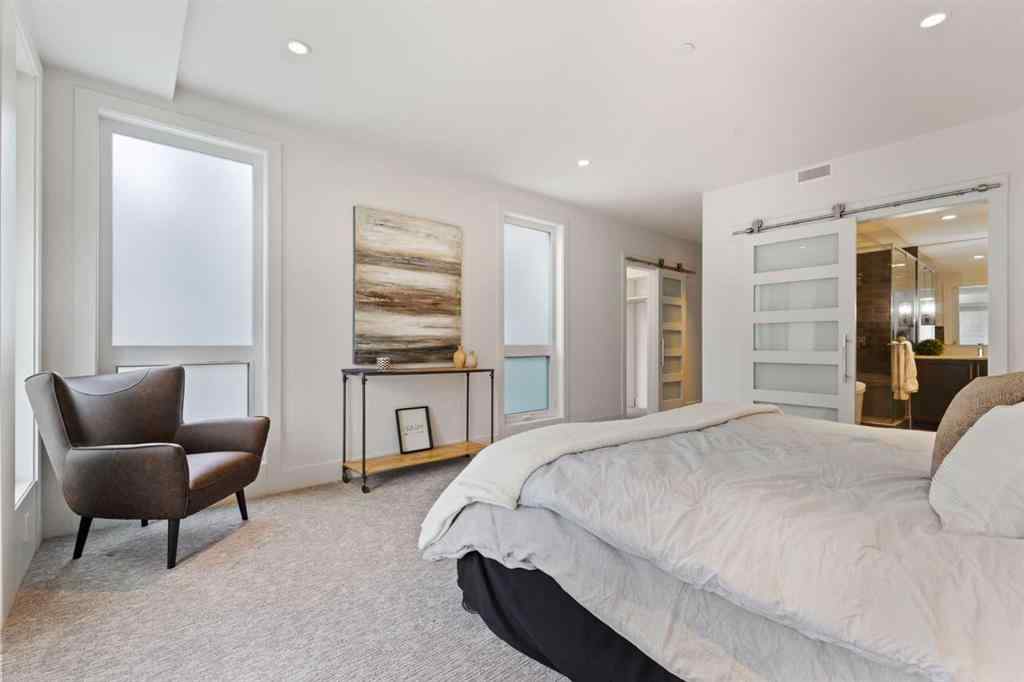 MLS® A2214279 - Unit #102 101A Stewart Creek Rise  in Three Sisters Canmore, Residential