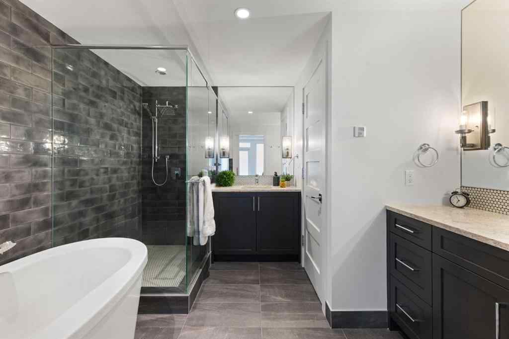 MLS® A2214279 - Unit #102 101A Stewart Creek Rise  in Three Sisters Canmore, Residential