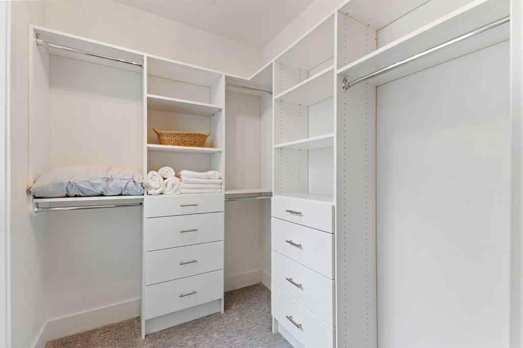 MLS® A2214279 - Unit #102 101A Stewart Creek Rise  in Three Sisters Canmore, Residential