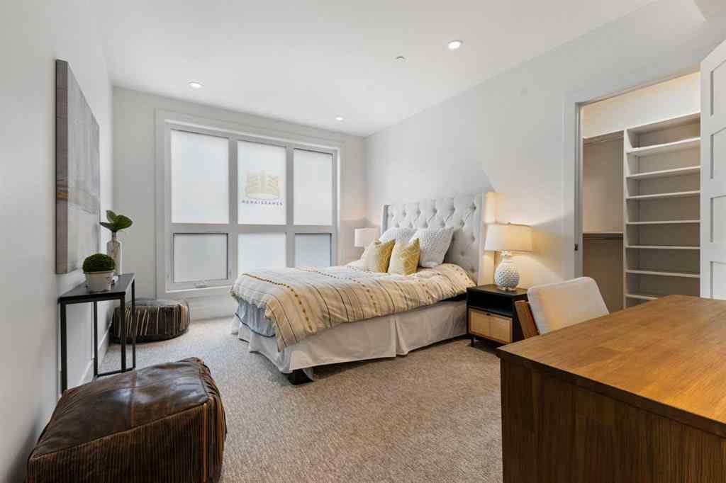 MLS® A2214279 - Unit #102 101A Stewart Creek Rise  in Three Sisters Canmore, Residential
