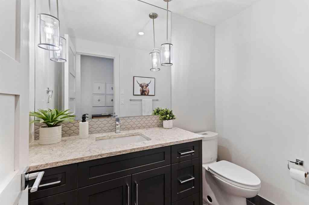 MLS® A2214279 - Unit #102 101A Stewart Creek Rise  in Three Sisters Canmore, Residential
