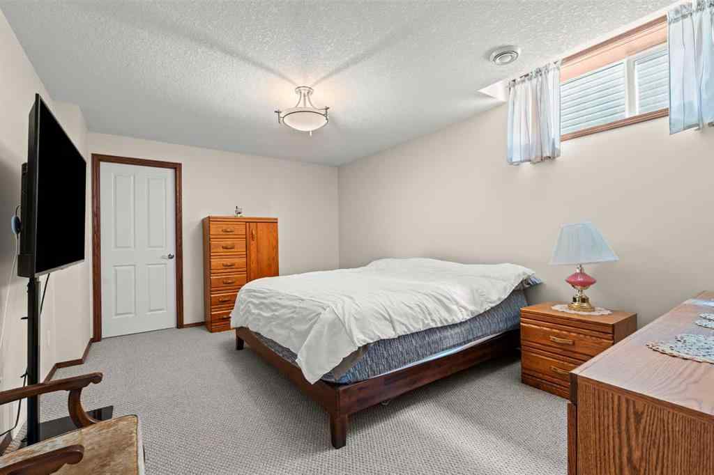 MLS® A2214598 - 421 Boulder Creek Way SE in Boulder Creek Estates Langdon, Residential