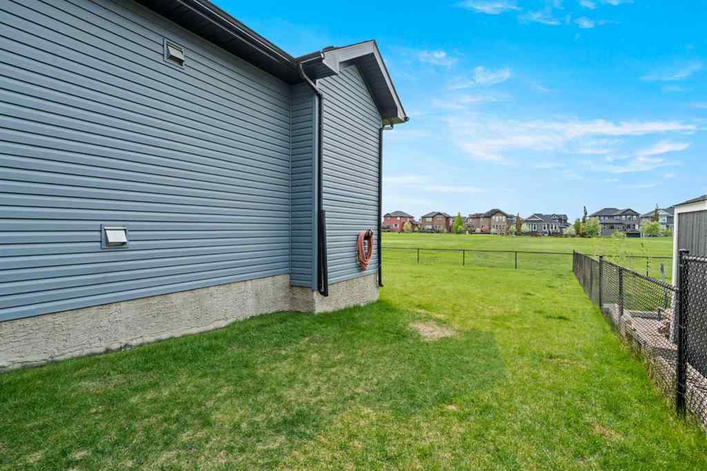 MLS® A2214598 - 421 Boulder Creek Way SE in Boulder Creek Estates Langdon, Residential