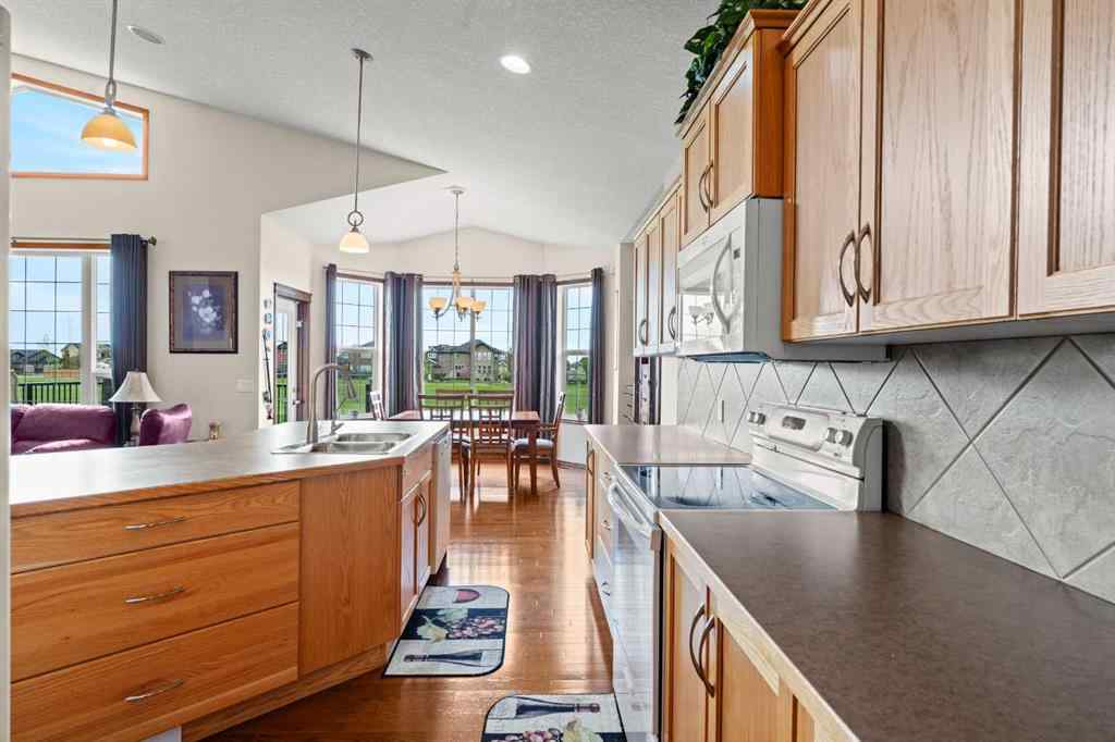 MLS® A2214598 - 421 Boulder Creek Way SE in Boulder Creek Estates Langdon, Residential