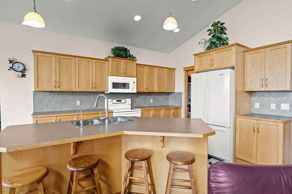 MLS® A2214598 - 421 Boulder Creek Way SE in Boulder Creek Estates Langdon, Residential