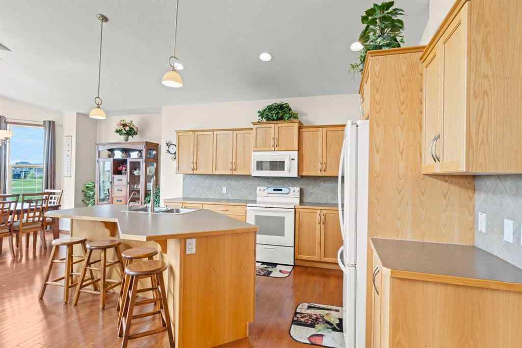 MLS® A2214598 - 421 Boulder Creek Way SE in Boulder Creek Estates Langdon, Residential