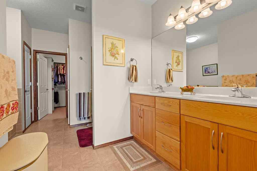 MLS® A2214598 - 421 Boulder Creek Way SE in Boulder Creek Estates Langdon, Residential