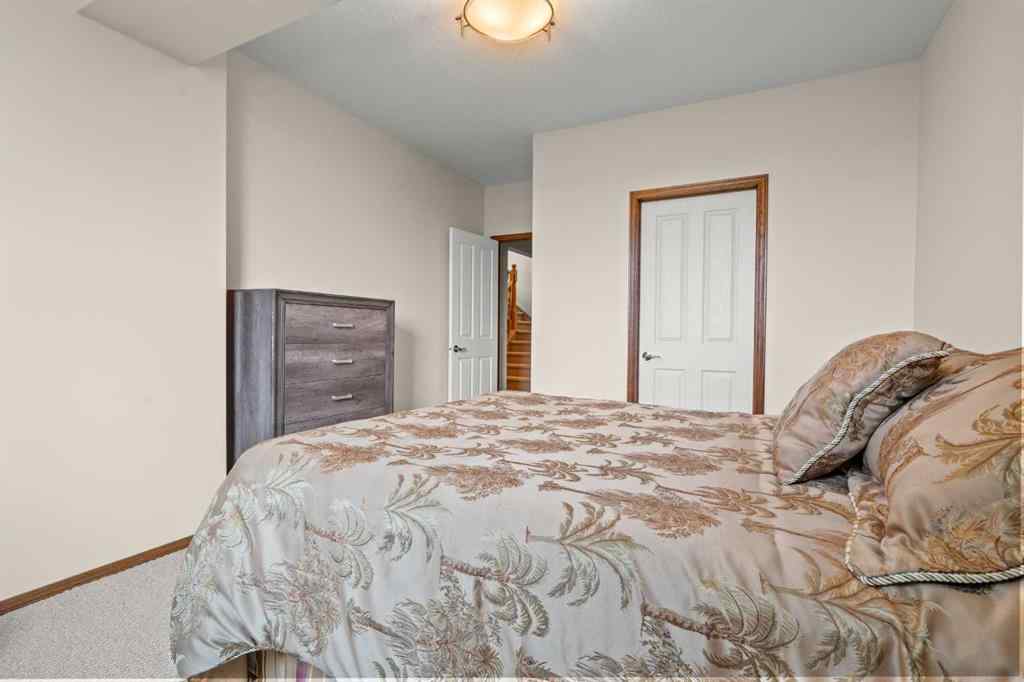 MLS® A2214598 - 421 Boulder Creek Way SE in Boulder Creek Estates Langdon, Residential