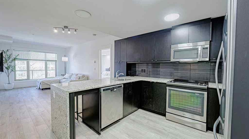 MLS® A2214621 - Unit #122 15 Aspenmont Heights SW in Aspen Woods Calgary, Residential