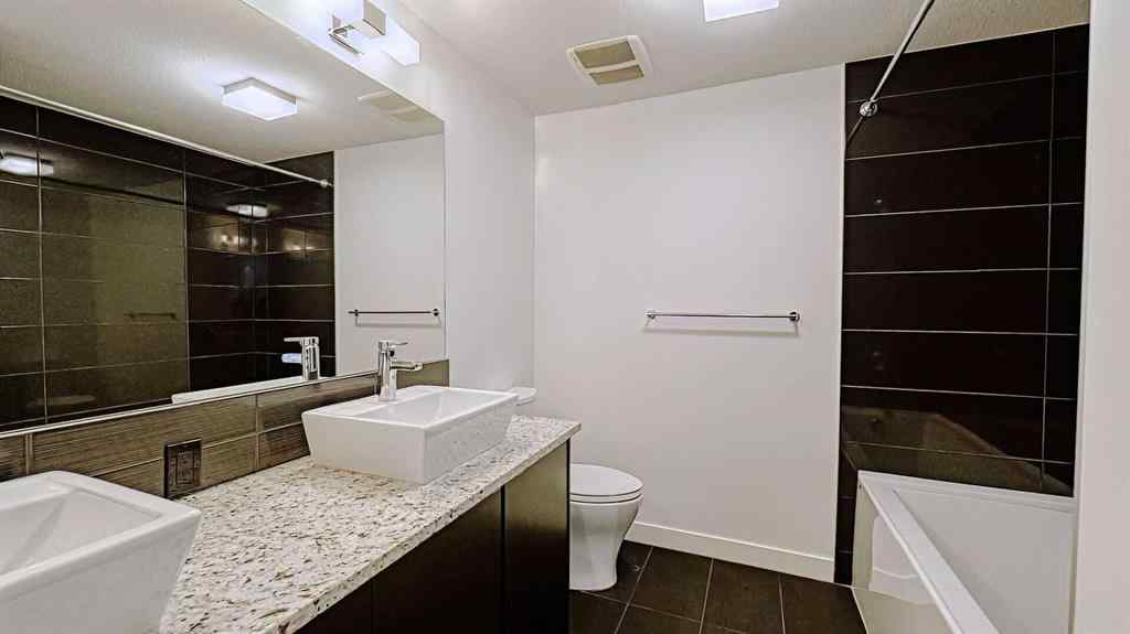 MLS® A2214621 - Unit #122 15 Aspenmont Heights SW in Aspen Woods Calgary, Residential