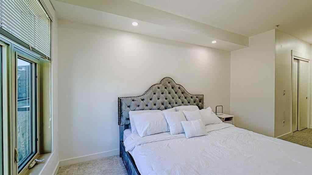 MLS® A2214621 - Unit #122 15 Aspenmont Heights SW in Aspen Woods Calgary, Residential
