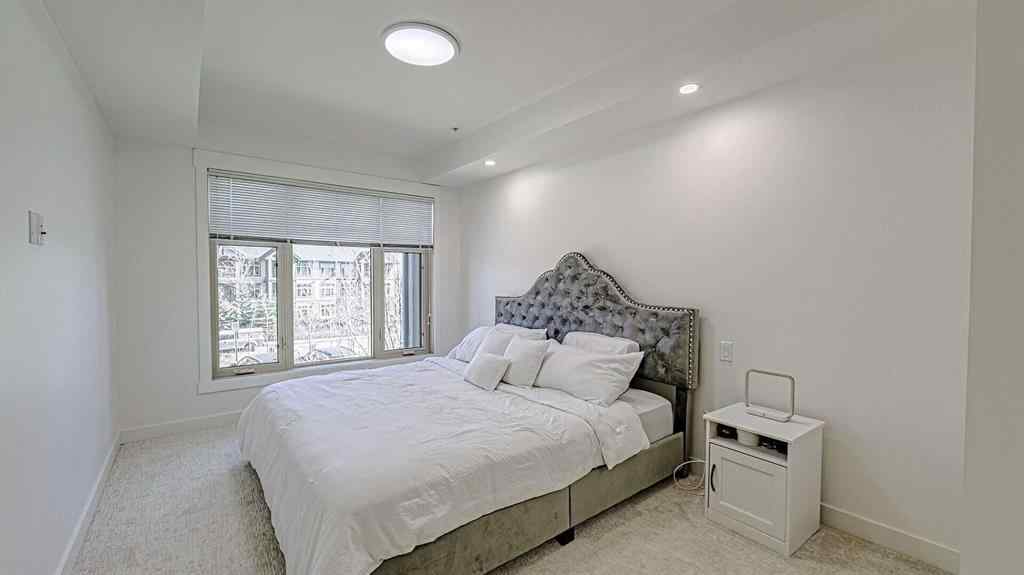 MLS® A2214621 - Unit #122 15 Aspenmont Heights SW in Aspen Woods Calgary, Residential