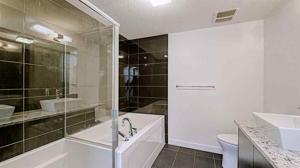 MLS® A2214621 - Unit #122 15 Aspenmont Heights SW in Aspen Woods Calgary, Residential