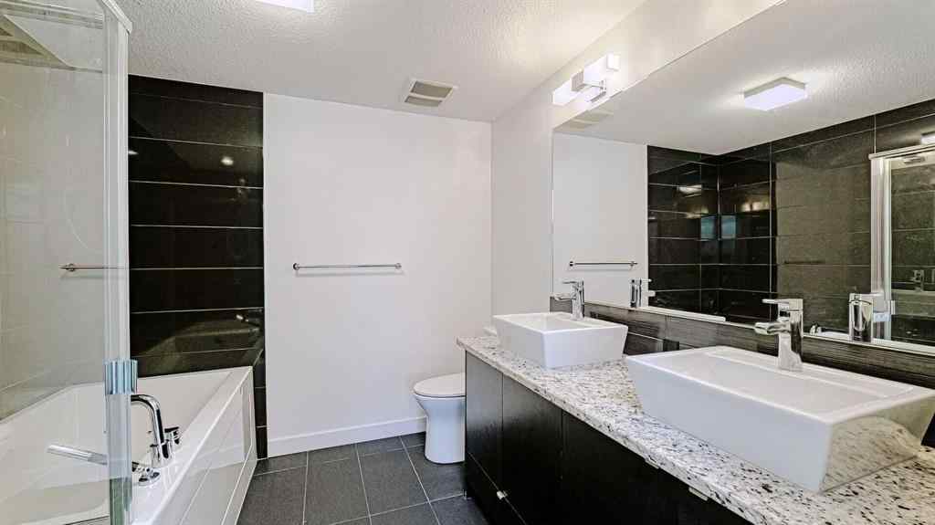 MLS® A2214621 - Unit #122 15 Aspenmont Heights SW in Aspen Woods Calgary, Residential