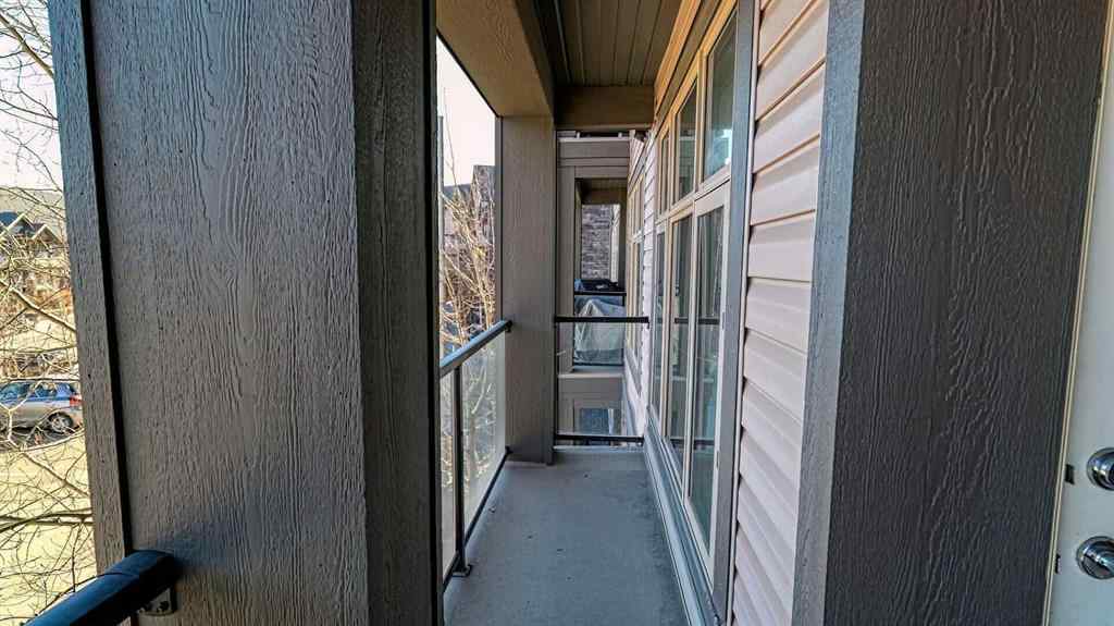MLS® A2214621 - Unit #122 15 Aspenmont Heights SW in Aspen Woods Calgary, Residential