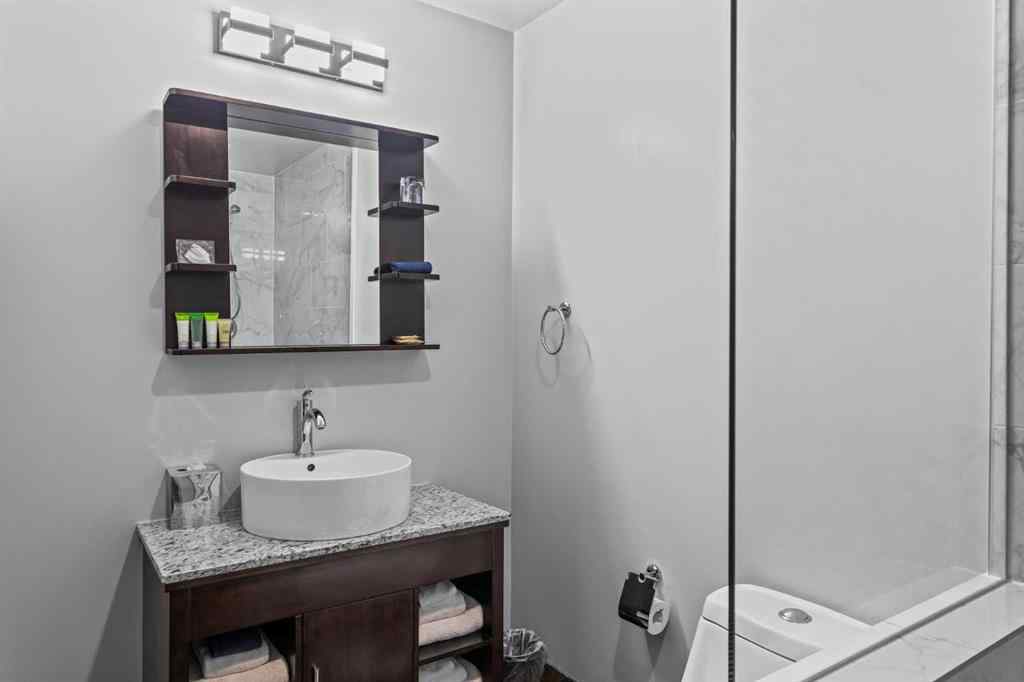 MLS® A2214877 - Unit #205 Rot. E+F 901 Mountain Street  in Bow Valley Trail Canmore, Residential