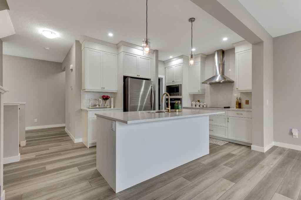 MLS® A2214962 - 216 Creekstone Row SW in Pine Creek Calgary, Residential