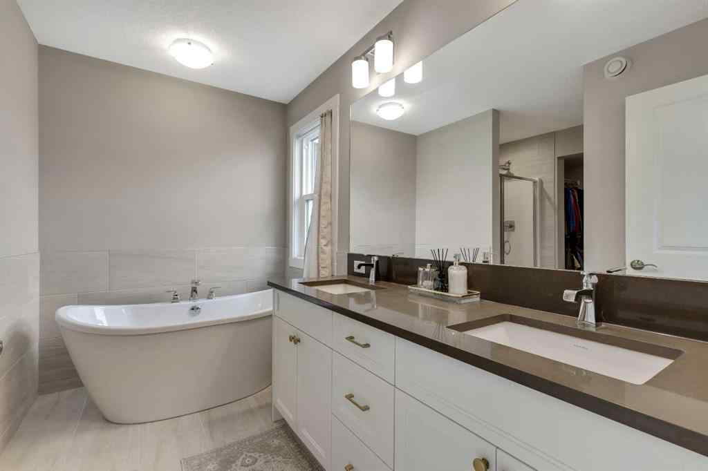 MLS® A2214962 - 216 Creekstone Row SW in Pine Creek Calgary, Residential