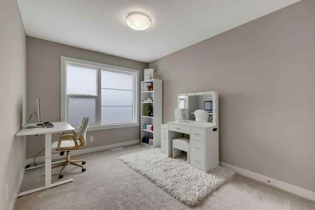 MLS® A2214962 - 216 Creekstone Row SW in Pine Creek Calgary, Residential