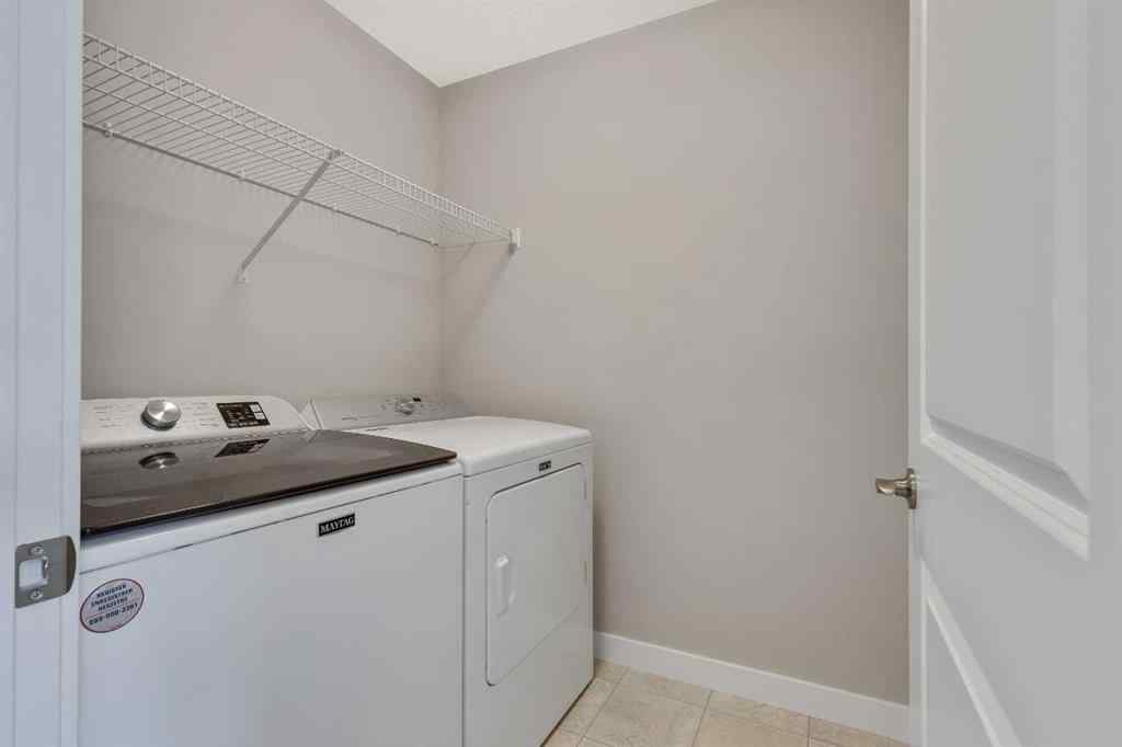 MLS® A2214962 - 216 Creekstone Row SW in Pine Creek Calgary, Residential