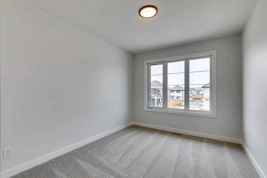 MLS® A2215003 - 99 Saddlebred Place  in Heartland Cochrane, Residential