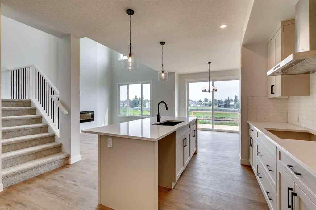 MLS® A2215003 - 99 Saddlebred Place  in Heartland Cochrane, Residential