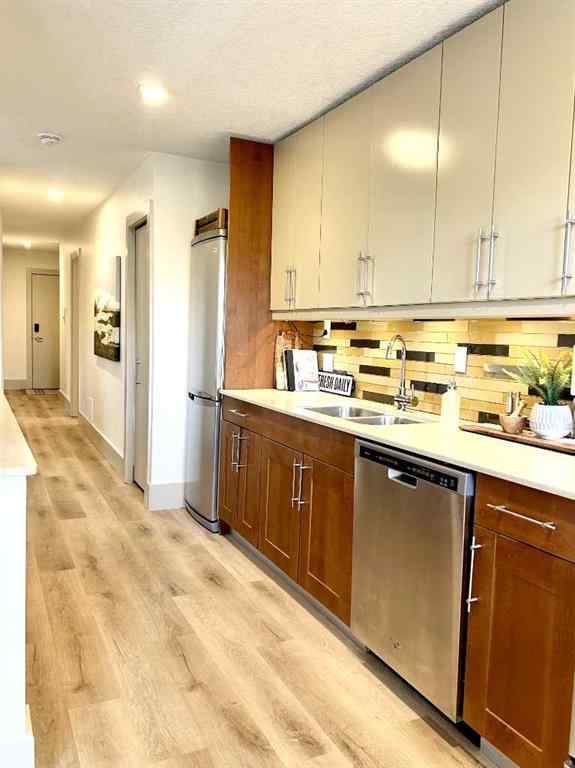 MLS® A2215103 - Unit #104 1603 26 Avenue SW in South Calgary Calgary, Residential