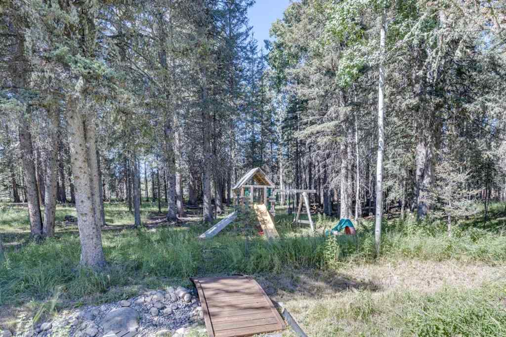 MLS® A2215187 - 118 Mountain Lion Drive  in Wintergreen_BC Bragg Creek, Residential