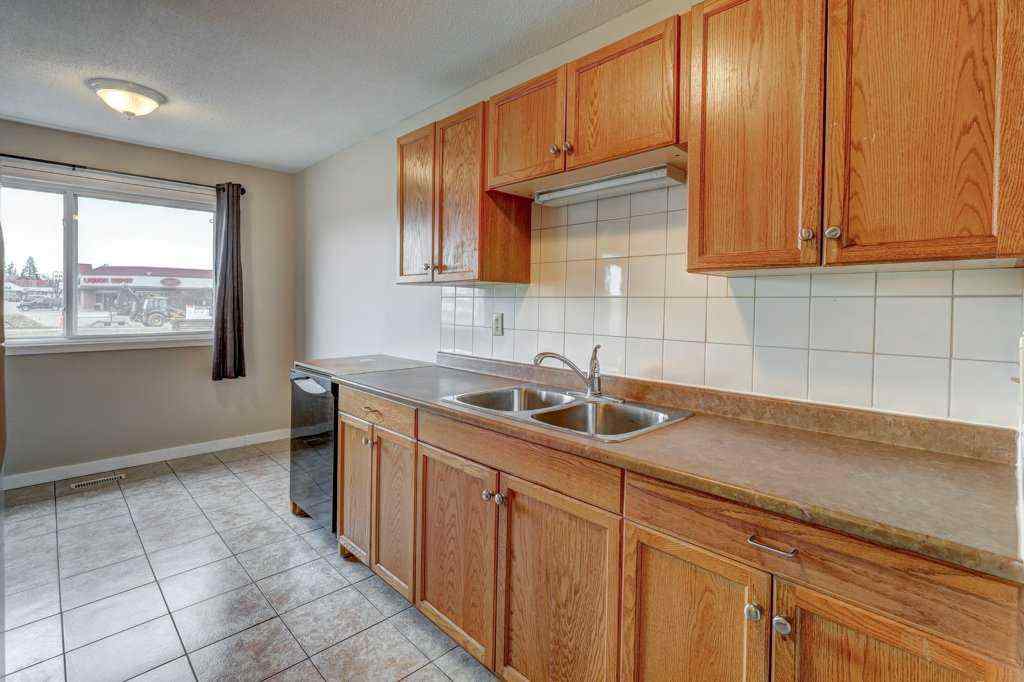 MLS® A2215361 - Unit #1 519 64 Street NE in Thorncliffe Calgary, Residential