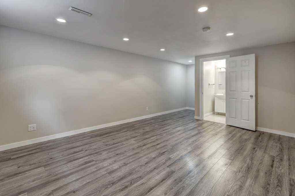 MLS® A2215361 - Unit #1 519 64 Street NE in Thorncliffe Calgary, Residential