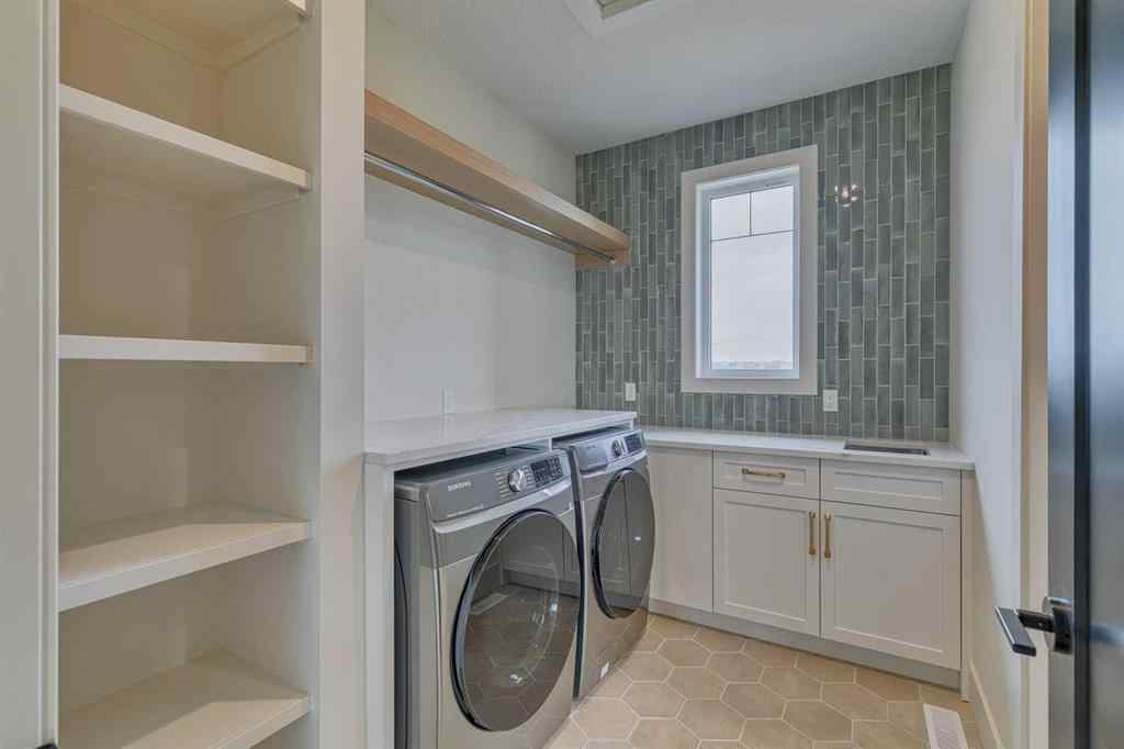 MLS® A2215484 - 703 Green Haven Place  in Green Haven Estates Rural Foothills County, Residential