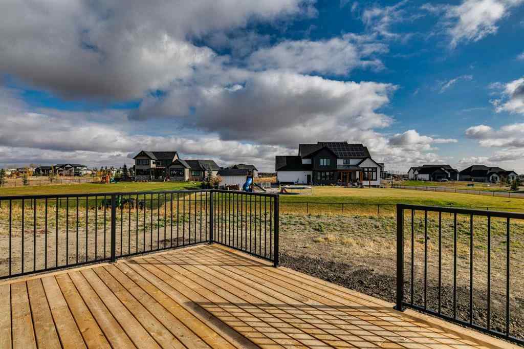 MLS® A2215484 - 703 Green Haven Place  in Green Haven Estates Rural Foothills County, Residential