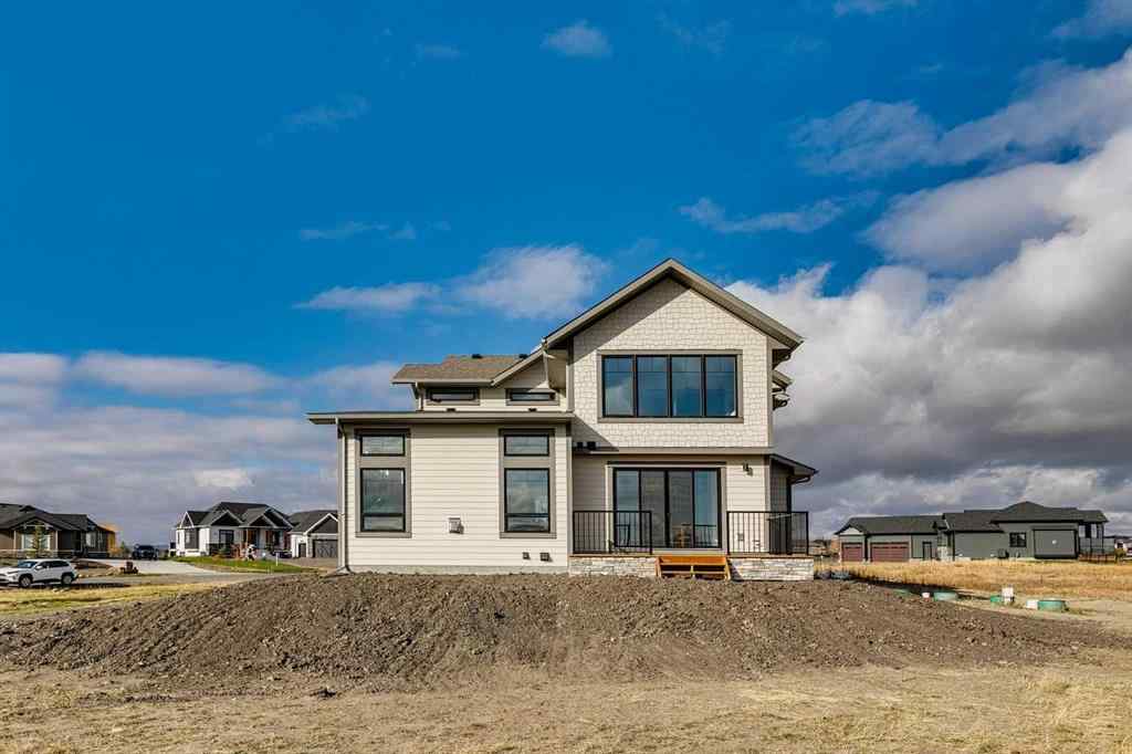MLS® A2215484 - 703 Green Haven Place  in Green Haven Estates Rural Foothills County, Residential