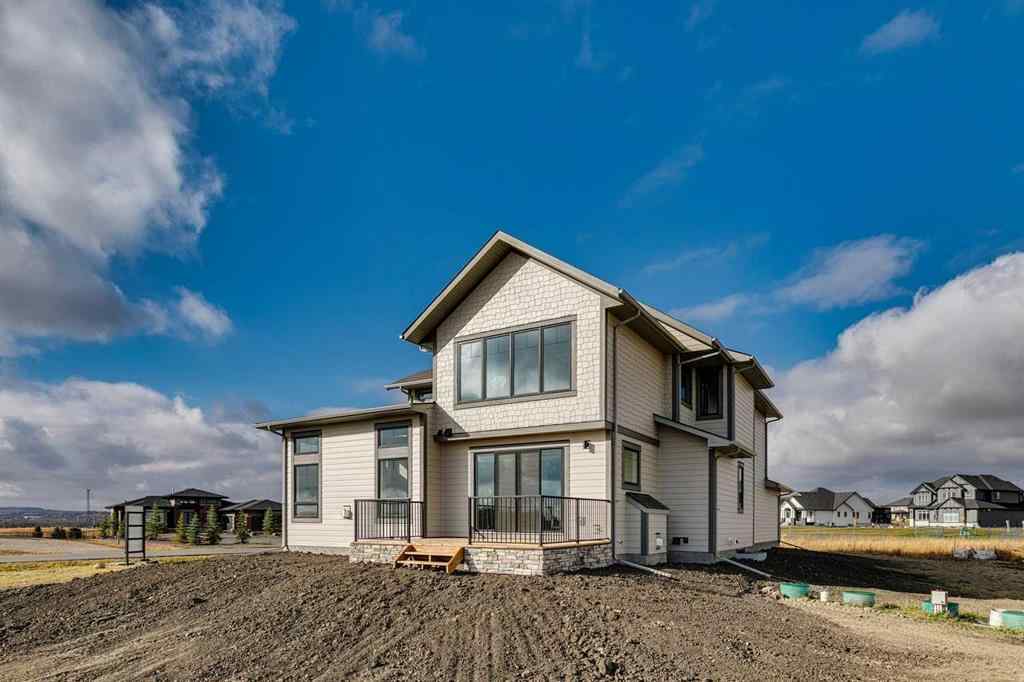 MLS® A2215484 - 703 Green Haven Place  in Green Haven Estates Rural Foothills County, Residential