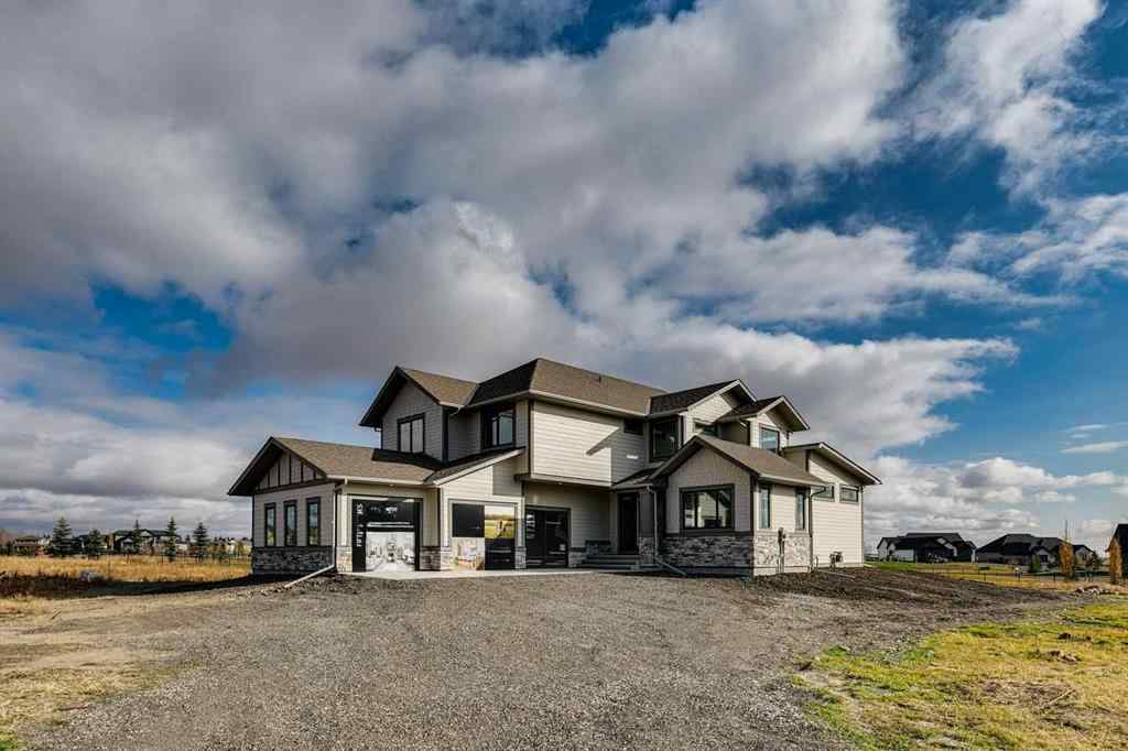 MLS® A2215484 - 703 Green Haven Place  in Green Haven Estates Rural Foothills County, Residential